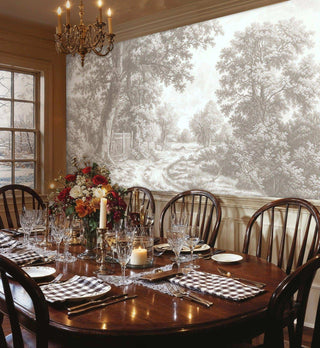Classic countryside wall mural with oak trees, shown in elegant dining room with crystal chandelier