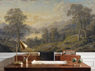 Classic mountain scenery wall mural with lake and hills displayed in a sophisticated home office with brass desk lamp