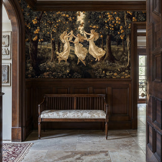 Classical figural wallpaper depicting three muses dancing in golden grove, featured in traditional entryway with wooden bench and ornate archway