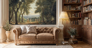 Classical grove wall mural with golden sunlight and robed figures, displayed in elegant library with leather sofa