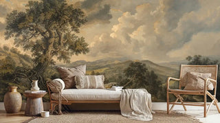 Classical landscape wall mural with ancient oak tree and rolling hills in warm earth tones, shown with woven furniture