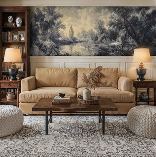 Classical landscape wall mural with river scene in cozy living room with built-in bookshelves