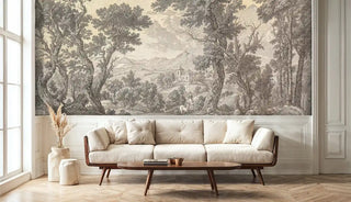 Classical landscape wallpaper with trees and distant buildings, bright living room with large windows