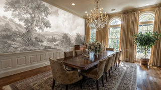Classical pastoral landscape wall mural featuring ancient trees and rolling hills in sepia tones, displayed in elegant dining room with crystal chandelier