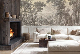 Classical pastoral landscape wall mural with detailed trees and distant castle, shown in rustic living room with fireplace
