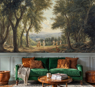 Classical tree grove wall mural in warm earth tones, shown in cozy living room with emerald green velvet sofa