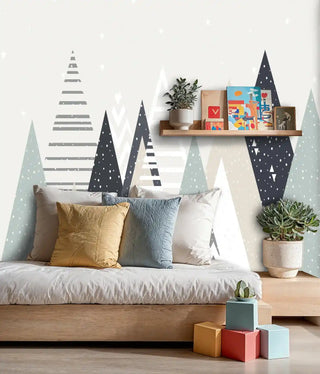 Contemporary triangle pattern wallpaper with mountain motifs, displayed in cozy bedroom with floating shelf and plants