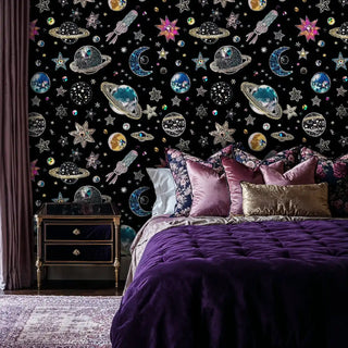 Cosmic space wallpaper with sparkling celestial motifs, displayed in luxurious bedroom with purple velvet bedding