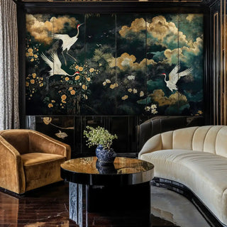 Crane and cloud wall mural with golden details, shown in elegant living room with curved cream sofa and blue vase