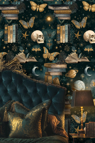 Dark academia wallpaper with vintage books, golden butterflies and skulls on teal, in moody bedroom with velvet pillows