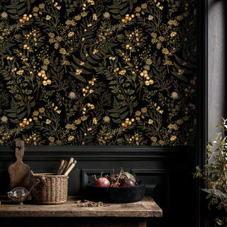 Dark botanical berry wallpaper with ferns on black ground, in a rustic kitchen with cutting board and fruit bowl