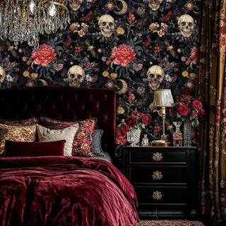 Dark botanical skull wallpaper in opulent bedroom with crystal chandelier and burgundy velvet bedding