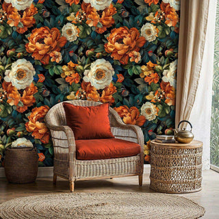 Dark botanical wallpaper with orange and cream peonies, shown in a natural-themed room with a wicker armchair and jute rug.