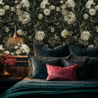 Dark botanical wallpaper with roses in sophisticated bedroom with copper pendant light