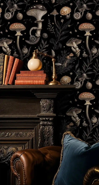 Dark botanical wallpaper with spotted mushrooms and forest elements, shown in elegant study with ornate fireplace and books