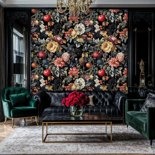 Dark botanical wallpaper with vibrant fruits and flowers on black background in elegant living room with brass chandelier