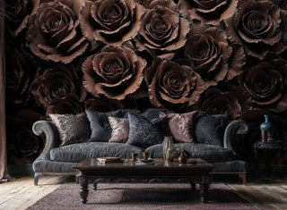 Dark floral wallpaper showing detailed burgundy roses in elegant living room with velvet sofa