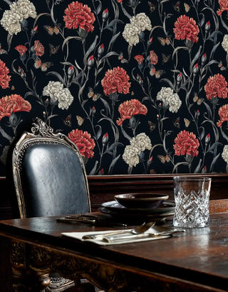 Dark floral wallpaper with coral carnations and butterflies in elegant dining room with antique furniture