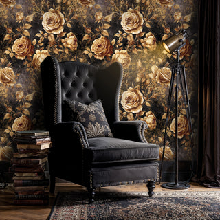 Dark floral wallpaper with gilded roses on black, with wingback chair and tripod lamp