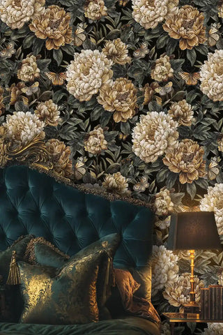 Dark floral wallpaper with golden blooms and butterflies, displayed in opulent living room with tufted velvet headboard