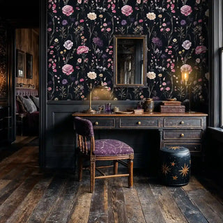 Dark floral wallpaper with pink peonies and purple cosmos on black, shown in elegant home office with antique desk