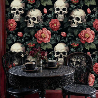 Dark romantic wallpaper featuring skulls and red peonies, displayed in dining room with cast iron table