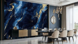 Deep ocean marble wall mural with blue and gold veining in elegant dining room with beige chairs