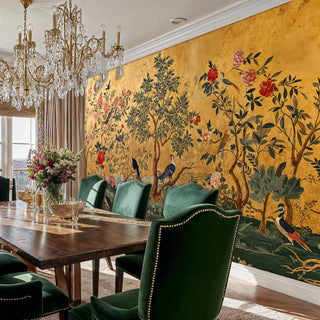 Detailed chinoiserie wall mural showing exotic birds in garden setting, featured in elegant dining room