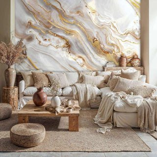 Detailed gilded marble Wall Mural, white and gold, in a living room with sectional sofa and poufs