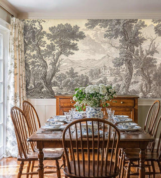 Detailed pastoral scene wall mural in beige and gray tones, traditional dining room with wooden furniture