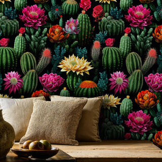 Detailed view of a cactus bloom wallpaper, green and black, shown behind bench and pillows