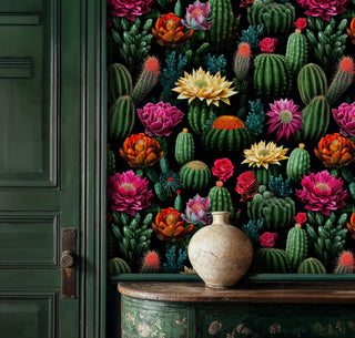 Detailed view of a cactus bloom wallpaper of lush cacti, green and black, shown with a vase