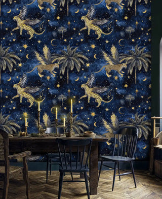Detailed view of a celestial wallpaper with winged leopards on navy, with black chairs