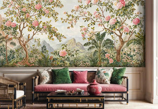 Detailed view of a chinoiserie Wall Mural featuring pink blooms, birds, green; black table