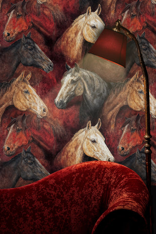 Detailed view of a Horse Wallpaper with expressive horse heads in red, brown and grey, beside a floor lamp