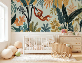 Detailed view of a jungle monkey wall mural, teal and gold leaves, nursery with wicker pram