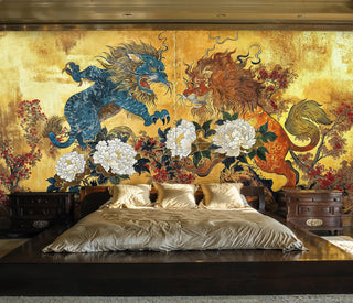 Detailed view of a mythic lions and peonies wall mural, gold and blue, with a low platform bed.