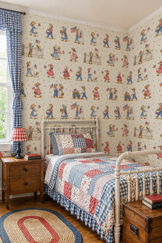 Detailed view of a patriotic children wallpaper with flags, stars and storybook figures, in a quilted bedroom setting.