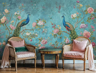 Detailed view of a peacock wall mural, teal and green florals, shown with cane chairs