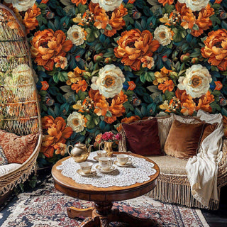 Detailed view of a peony wallpaper in orange and ivory, with wicker chair and tea set
