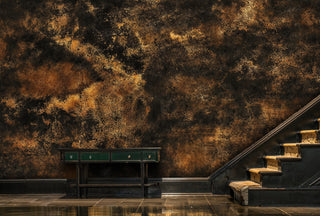Detailed view of an abstract texture Wall Mural in black and brown, shown by a staircase and narrow console table.