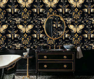 Detailed view of black-gold moth wallpaper, shown with a freestanding tub