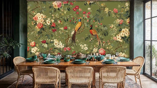 Detailed view of chinoiserie wall mural with pheasants on olive shown by rattan chairs