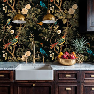 Detailed view of chinoiserie wallpaper, black and green, in kitchen with brass pendants