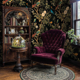 Detailed view of chinoiserie wallpaper, black and green, with bookcase and terrarium lamp
