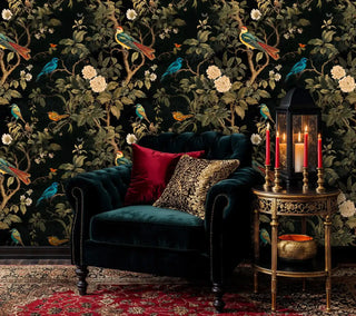 Detailed view of chinoiserie wallpaper, black and green, with green sofa and candle lantern