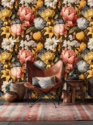 Detailed view of dark floral Wallpaper with bold blooms, beside a leather butterfly chair