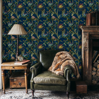 Detailed view of hummingbird wallpaper in navy and green, with fireplace