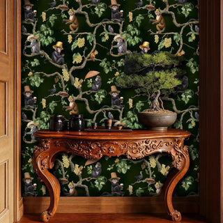 Detailed view of vineyard monkey wallpaper with deep green and gold vines with a bonsai tree