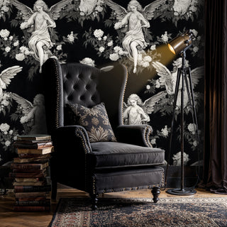 Dramatic angel wallpaper with flowing robes and wings, displayed in study with leather chair and tripod lamp